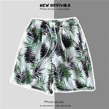 Load image into Gallery viewer, Summer Seaside Vacation Floral Shorts Men's Five-quarter Pants Casual Large Size Hawaiian Shorts Loose Beach Pants - Leaf Style