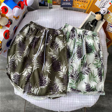 Load image into Gallery viewer, Summer Seaside Vacation Floral Shorts Men's Five-quarter Pants Casual Large Size Hawaiian Shorts Loose Beach Pants - Leaf Style