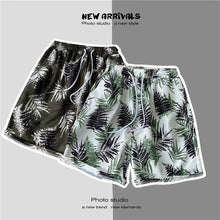 Load image into Gallery viewer, Summer Seaside Vacation Floral Shorts Men's Five-quarter Pants Casual Large Size Hawaiian Shorts Loose Beach Pants - Leaf Style