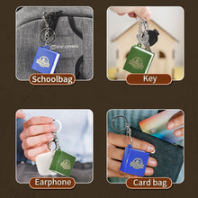 Load image into Gallery viewer, 3D Dinosaur Foldable Book Key Chain Toys Kids Pop Out Mini Book Astronaut Wacky Toys Trick Stress Relief Toy