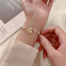 Load image into Gallery viewer, Vintage Niche Wrapped Pearl Bracelet Temperamental Alloy Beaded Human Figure Pendant Bracelet Hand Jewelry
