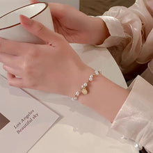Load image into Gallery viewer, Vintage Niche Wrapped Pearl Bracelet Temperamental Alloy Beaded Human Figure Pendant Bracelet Hand Jewelry