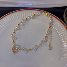 Load image into Gallery viewer, Vintage Niche Wrapped Pearl Bracelet Temperamental Alloy Beaded Human Figure Pendant Bracelet Hand Jewelry