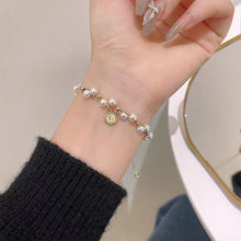 Load image into Gallery viewer, Vintage Niche Wrapped Pearl Bracelet Temperamental Alloy Beaded Human Figure Pendant Bracelet Hand Jewelry
