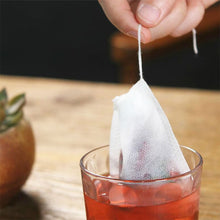 Load image into Gallery viewer, 100pcs Disposable Tea Bags with String Heal Seal Non-woven Fabric Tea Filter Bag for Herb Loose Tea Teaware Spice Filter Bag