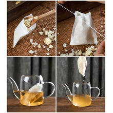Load image into Gallery viewer, 100pcs Disposable Tea Bags with String Heal Seal Non-woven Fabric Tea Filter Bag for Herb Loose Tea Teaware Spice Filter Bag
