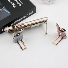 Load image into Gallery viewer, 1PC Portable Electroplated Smile Rabbit Pasteable Mobile Phone Stand Hardware Push Rod Foldable Desktop Lazy Stand