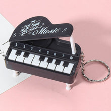 Load image into Gallery viewer, Mini Electronic Piano with Light Training Finger Piano Keychain Keyboard Piano Portable Musical Instrument Toy Key Ring