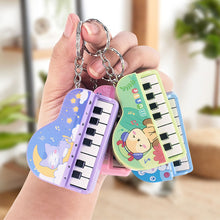 Load image into Gallery viewer, Mini Electronic Piano with Light Training Finger Piano Keychain Keyboard Piano Portable Musical Instrument Toy Key Ring