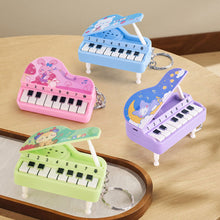 Load image into Gallery viewer, Mini Electronic Piano with Light Training Finger Piano Keychain Keyboard Piano Portable Musical Instrument Toy Key Ring