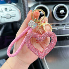 Load image into Gallery viewer, Car Hollow Love Out Ceramic Clay Full Diamond Key Chain Leather Rope Sticking Water Diamond Key Pendant Simple