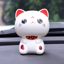 Load image into Gallery viewer, Cute Nod Head Solar Powered Lucky Fortune Cat Wealth Waving Figurines for Home Decorations for Car Decorations and for Gift