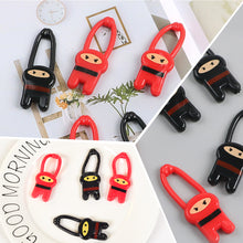 Load image into Gallery viewer, New and Unique Prank Toy TPR Children's Nostalgic Launch Elastic Hang Card Little Person Prank Ninja Launcher Toys