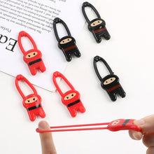 Load image into Gallery viewer, New and Unique Prank Toy TPR Children's Nostalgic Launch Elastic Hang Card Little Person Prank Ninja Launcher Toys