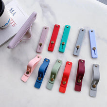 Load image into Gallery viewer, Universal Wrist Band Phone Holder For iPhone Finger Grip Mobile Phone Stand for samsung xiaomi Push Back Sticked Socket Bracket