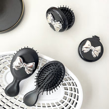 Load image into Gallery viewer, Cute Bowknot Airbag Comb Cartoon Mini Folding Portable Air Cushion Comb Massage Scalp Hairdressing Hair Comb Hair Styling Tool