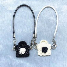 Load image into Gallery viewer, Dollhouse Mini Model Camellia Black and White Bag Hanging Neck Accessories Doll Pendant Accessories