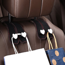 Load image into Gallery viewer, Car Seat Headrest Hooks 2 in 1 Leather Heart Shape Metal Back Hook Purse and Bag Backpack Double Hook Seat Hanger