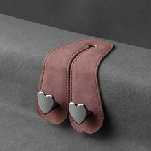 Load image into Gallery viewer, Car Seat Headrest Hooks 2 in 1 Leather Heart Shape Metal Back Hook Purse and Bag Backpack Double Hook Seat Hanger