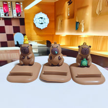 Load image into Gallery viewer, Capybara Phone Holder PVC Doll Support Capybara Mobile Phone Stand Cartoon Animal Capybara Cell Phone Bracket