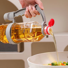 Load image into Gallery viewer, Adjustable Bottle Handle Grip Multi-Purpose Innovative Easy-Pour Liquid Dispenser Bottle Handling Solution Kitchen Bottle Lifting Assistant Helper