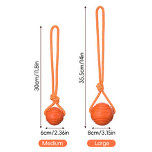 Load image into Gallery viewer, Solid Rubber Rope Ball Dog Toy Bite Resistant Chew Ball with Rope Handle for Interactive Tug of War & Outdoor Fetch Training Toy for Medium Large Dogs