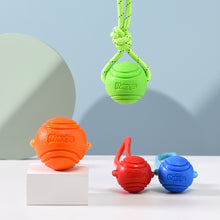 Load image into Gallery viewer, Solid Rubber Rope Ball Dog Toy Bite Resistant Chew Ball with Rope Handle for Interactive Tug of War & Outdoor Fetch Training Toy for Medium Large Dogs