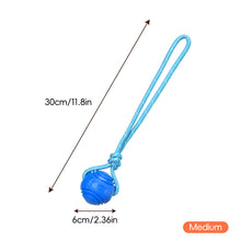 Load image into Gallery viewer, Solid Rubber Rope Ball Dog Toy Bite Resistant Chew Ball with Rope Handle for Interactive Tug of War & Outdoor Fetch Training Toy for Medium Large Dogs