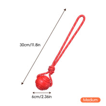 Load image into Gallery viewer, Solid Rubber Rope Ball Dog Toy Bite Resistant Chew Ball with Rope Handle for Interactive Tug of War & Outdoor Fetch Training Toy for Medium Large Dogs