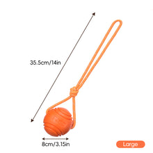 Load image into Gallery viewer, Solid Rubber Rope Ball Dog Toy Bite Resistant Chew Ball with Rope Handle for Interactive Tug of War & Outdoor Fetch Training Toy for Medium Large Dogs