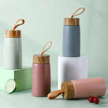 Load image into Gallery viewer, New Style Portable Handheld Stainless Steel Thermos Cup Creative Wood Grain Cover For Outdoor Travel Camping