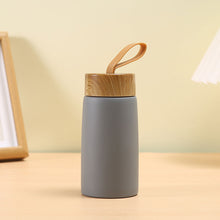 Load image into Gallery viewer, New Style Portable Handheld Stainless Steel Thermos Cup Creative Wood Grain Cover For Outdoor Travel Camping