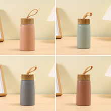 Load image into Gallery viewer, New Style Portable Handheld Stainless Steel Thermos Cup Creative Wood Grain Cover For Outdoor Travel Camping