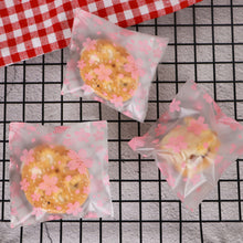 Load image into Gallery viewer, 100pcs Sakura Flower Snack Cookie Sealing Bag Self-Adhesive Wedding Birthday Party Candy Biscuit Packaging Gift Bag