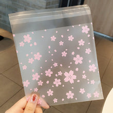 Load image into Gallery viewer, 100pcs Sakura Flower Snack Cookie Sealing Bag Self-Adhesive Wedding Birthday Party Candy Biscuit Packaging Gift Bag