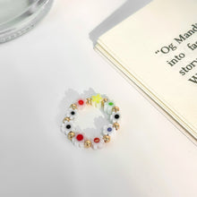 Load image into Gallery viewer, Fashion Colored Glass Flower Beaded Elastic Rope Ring Cute Handwoven Small Flower Beaded Ring Ring Jewelry Accessories