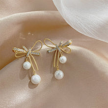 Load image into Gallery viewer, Cutout Bow Pearl Pendant Stud Earrings Bow Diamond Earrings Creative Simple Accessories Jewelry for Women