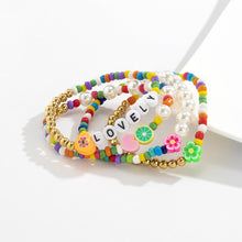 Load image into Gallery viewer, 4pcs/set Retro Stitching Soft Clay Small Flower Heart Rice Beads Bracelet Set Temperament Imitation Pearl Heart Letter Bracelet