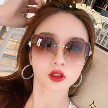 Load image into Gallery viewer, Fashion Frameless Sunglasses UV Protection Sunglasses Simple Personality Sunglasses Outdoor Glasses For Women