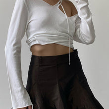 Load image into Gallery viewer, Fashion Sloping Shoulder Fake Two-piece Stitching Long-sleeved T-shirt Lace-up Solid Color Top Women
