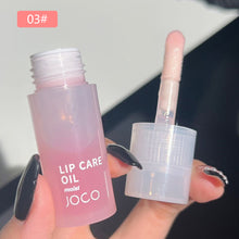Load image into Gallery viewer, Lip Oil Transparent Lip Gloss Moisturizing Lip Balm Primer Colorless Lip Gloss Lipstick Base Fragrance Non-sticky Moisturizes