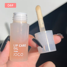 Load image into Gallery viewer, Lip Oil Transparent Lip Gloss Moisturizing Lip Balm Primer Colorless Lip Gloss Lipstick Base Fragrance Non-sticky Moisturizes