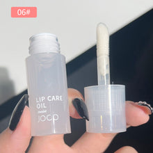 Load image into Gallery viewer, Lip Oil Transparent Lip Gloss Moisturizing Lip Balm Primer Colorless Lip Gloss Lipstick Base Fragrance Non-sticky Moisturizes