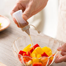 Load image into Gallery viewer, 4PCS/Set Transparent Sauce Bottle with Lid Portable Mini Seasoning Box Dispenser Condiment Salt Spice Jar Sauce Squeeze Bottle Camping Hiking Outdoor Sauce Dispenser