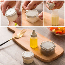 Load image into Gallery viewer, 4PCS/Set Transparent Sauce Bottle with Lid Portable Mini Seasoning Box Dispenser Condiment Salt Spice Jar Sauce Squeeze Bottle Camping Hiking Outdoor Sauce Dispenser