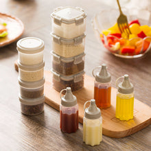 Load image into Gallery viewer, 4PCS/Set Transparent Sauce Bottle with Lid Portable Mini Seasoning Box Dispenser Condiment Salt Spice Jar Sauce Squeeze Bottle Camping Hiking Outdoor Sauce Dispenser