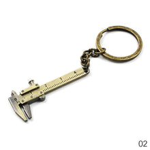 Load image into Gallery viewer, Mental Movable Vernier Caliper Ruler Model Keychain Mini Vernier Caliper Key Ring Car Turbo Key Chain Gauge Tool
