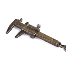 Load image into Gallery viewer, Mental Movable Vernier Caliper Ruler Model Keychain Mini Vernier Caliper Key Ring Car Turbo Key Chain Gauge Tool
