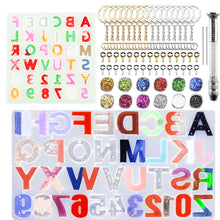 Load image into Gallery viewer, 255 PCS Alphabet Letter Number Resin Molds Set with Hand Drill, 2 Silicone Resin Molds, 40 Key Rings, 12 Resin Glitters, 100 Screw Eye Pins, 100 Opening Rings, Reversed Epoxy Resin Casting Molds Backward Keychain Resin Molds
