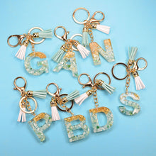 Load image into Gallery viewer, Women Fashion 26 Letters Resin Keychains Gold Foil Bag Pendant Charms Handbag Accessories Tassel Key Rings

